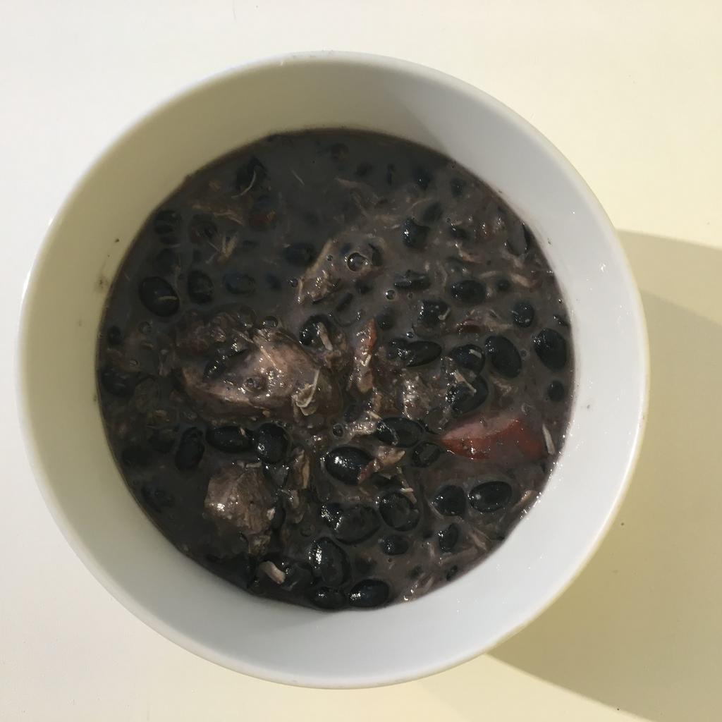 Feijoada side · Brazilian traditional black bean stew with pieces
of baby back ribs, pork sausage , pork loin and
bacon