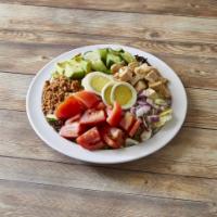 Cobb Salad · Mixed greens, grilled chicken, tomato, cucumbers, avocado, bacon, hard-boiled egg and red on...
