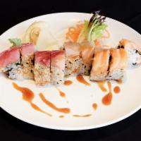 Yummy Roll · Shrimp tempura roll topped with tuna, izumidai, and salmon.
