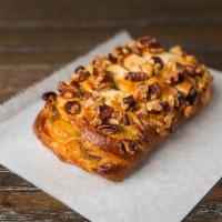 Maple Pecan Croissant · Stuffed maple croissant with crumbled pecan on top.