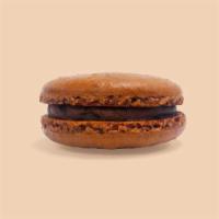 Chocolate Macaron · Our decadent chocolate ganache filled macaron will satisfy any chocolate lover’s craving.