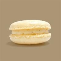 Vanilla Bean Macaron · Our fluffy buttercream is packed with vanilla bean to make this macaron exquisitely flavorful.