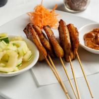 Satay Chicken Appetizer · Chicken marinated in Thai spices, skewered and char-grilled. Experienced with peanut sauce a...