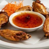 Phuket Wings Appetizer · Fried chicken wings with Phuket sweet and sour sauce.
