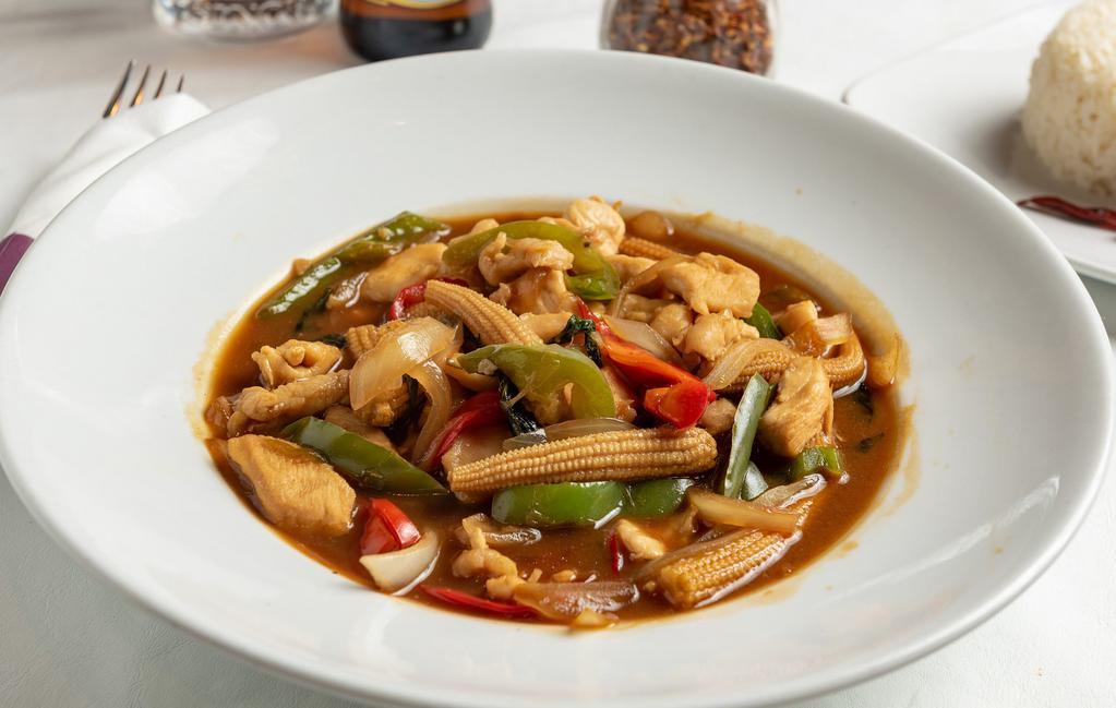 Basil Chicken · Gently-tossed chicken with Phuket sauce, fresh chili, Thai basil, baby corn, bell pepper, and onion.