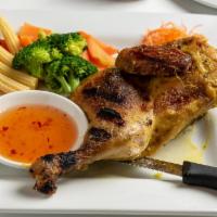 Thai BBQ Chicken · Tendered chicken, marinated with Phuket special recipe, served with sweet and sour sauce, st...