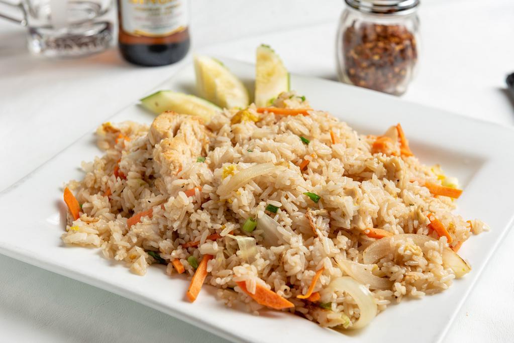 Fried Rice · Everyone's favorite, fried rice with egg, onion, carrot, and scallions with your choice of chicken, and beef or tofu. Add proteins for an additional charge.