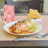Wet Burrito with Chips · Flour tortilla, choice of meat, Mexican rice, Whole Pinto beans, pico de gallo and jack/ched...