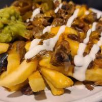 Papas (Asada Fries) · French fries, choice of meat, beans, jack and cheddar cheese, sour cream, guacamole and jala...