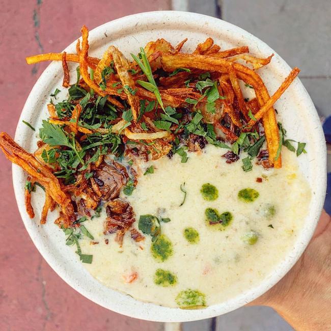 Sopa de Mani (Peanut Soup) (d) - Small (12oz) · Bolivian creamy peanut soup w. smoked brisket, peas and potatoes.  Topped with truffled shoestring fries and parsley.

*Dairy free - creamy profile comes from the peanuts