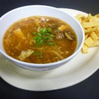 Hot and Sour Soup · Bamboo Shoots, eggs, pork and fresh mushrooms in delicious hot and sour soup