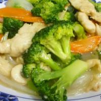 Broccoli Chicken · Chicken with broccoli, carrot and onion in white sauce, comes with side of steamed rice or f...