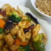 Hunan Chicken · Stir fried chicken with plenty of vegitables and mushrooms, spicy, comes with side of steame...