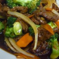 Broccoli Beef · Juicy beef stir fried with Broccoli onion and carrot, comes with steamed rice or fried rice ...