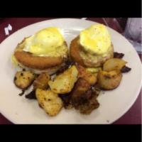 Maryland Benedict · 2 Poached farm eggs on crab cakes and served with your side choice.