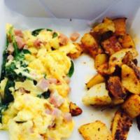 Green Eggs and Ham · Two scrambled farm eggs with ham, sautéed spinach, seared ham, melted cheddar cheese served ...
