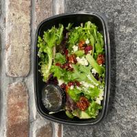 House Salad · Spring mix, toasted pecans, feta cheese crumbles, dried cranberries, and house-made vinaigre...