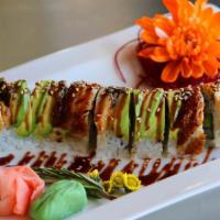Black Dragon Roll · Inside: crab meat, avocado, and cucumber. Top: sliced avocado and BBQ eel with eel sauce.  
