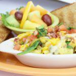 Eye Opener · Freshly cracked eggs scrambled with portabella mushrooms, chives, fresh spniach, bacon toppe...