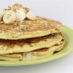 Banana Nut Cakes · Bananas, crunchy granola and almonds baked into three of our homemade pancakes. Topped with ...