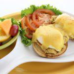 Crab Cake Benny · Two Maryland-style crab cakes made with 100% blue crab, topped with two poached eggs* on a t...