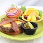 Angus Cheeseburger · 1/2 lb. burger with a blend of Monterey Jack and cheddar cheeses. Served with lettuce, tomat...