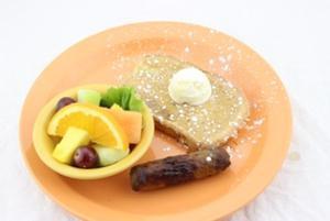 Kids French Toast · One slice of French toast, one strip of bacon or one sausage link, and a cup of fruit