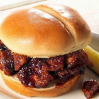 Pork Burnt Ends Sandwich · Tender, hand cut pork chunks in our zesty grilling sauce.