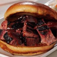 Ltd. Reserve Burnt Ends Sandwich · Tender chunks of beef brisket lightly dusted with a sweet and spicy dry rub and pit charred ...