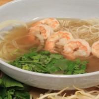 41 - Shrimp Pho · 5 Shrimps.  Flat rice noodles in beef/chicken broth with toppings; garnished with yellow oni...