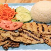 74 - Grilled Pork Broken Rice · Grilled pork. Broken rice, lettuce, cucumber, tomatoes, pickled carrots and sauteed scallion...