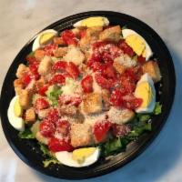 Caesar Salad · Lettuce, tomato, egg, croutons and shaved Parmesan cheese.