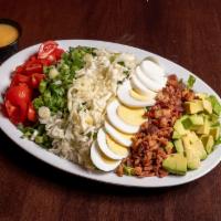 Cobb Salad · Lettuce, cherry tomatoes, scallions, avocado, egg, bacon and mozzarella.