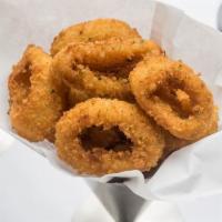 Thick Cut Onion Rings · Served with Truffle Aioli.