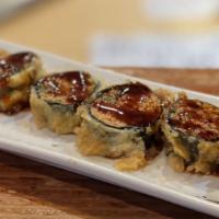 Spicy Tune Crunch · Deep-fried spicy tuna and scallions wrapped with seaweed, ell sauce, and ponzu sauce.