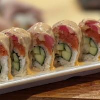 Red Rock Roll · Shrimp tempura and cucumber topped with spicy tuna and pepper seared tuna, tangy sauce, and ...