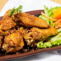 Wings (8 pcs) · Fresh fried jumbo chicken wings with our hot Thai garlic sauce. Only available in medium or ...