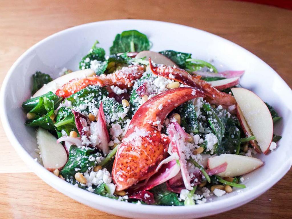 Lobster Kale Salad · Lobster, baby kale, gala apples, toasted pine nuts, crumbled goat & grated Parmesan cheeses with a red wine vinaigrette.