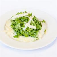 Arugula Salad · Shaved Parmigiano, lemon olive oil.