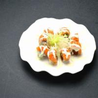 Frisco Roll · Spicy tuna roll with fresh salmon, creamy wasabi sauce.