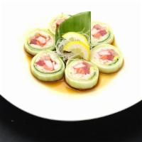 Fantasy Roll · Tuna, salmon, yelltowtail, crab meat, shrimp, crab stick, avocado wrapped with cucumber & po...