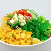 Buddha Bowl · Fried tofu, green onion, seaweed, salad mix, seaweed salad, edamame, corn, tomato, pineapple...