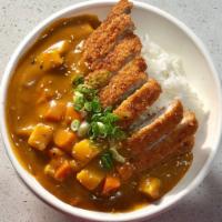 Pork Katsu curry · Deep fried Pork cutlet served with vegetable curry over the rice