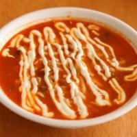 Vegetable Chili · Topped with jack cheese and sour cream. 