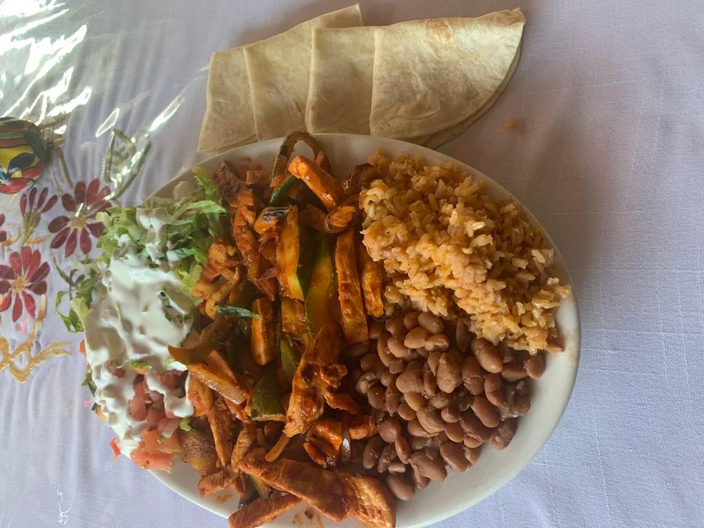 Grilled Chicken Fajita Platter · Served with four tortillas, Mexican rice, red beans, pico de gallo, lettuce, and sour cream.