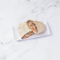 Burrito · Your choice of pork, chicken, or beans overstuffed into a 12” flour tortilla with rice, bean...
