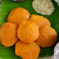 Potato Bajji · Vegan & Vegetarian-Potato fritters marinated in chickpea flour and fried