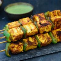 Paneer Tikka · Vegetarian- Chunks of cottage cheese tossed in spices and yogurt.