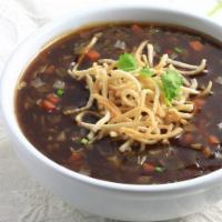 Vegetable Manchow Soup · Vegetarian-Spicy and hot broth made from vegetables and topped with fried noodles