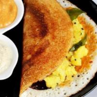 Masala Dosa · Vegan & Vegetarian- Dosa, thin rice crepes stuffed with mashed potato served with sambar and...